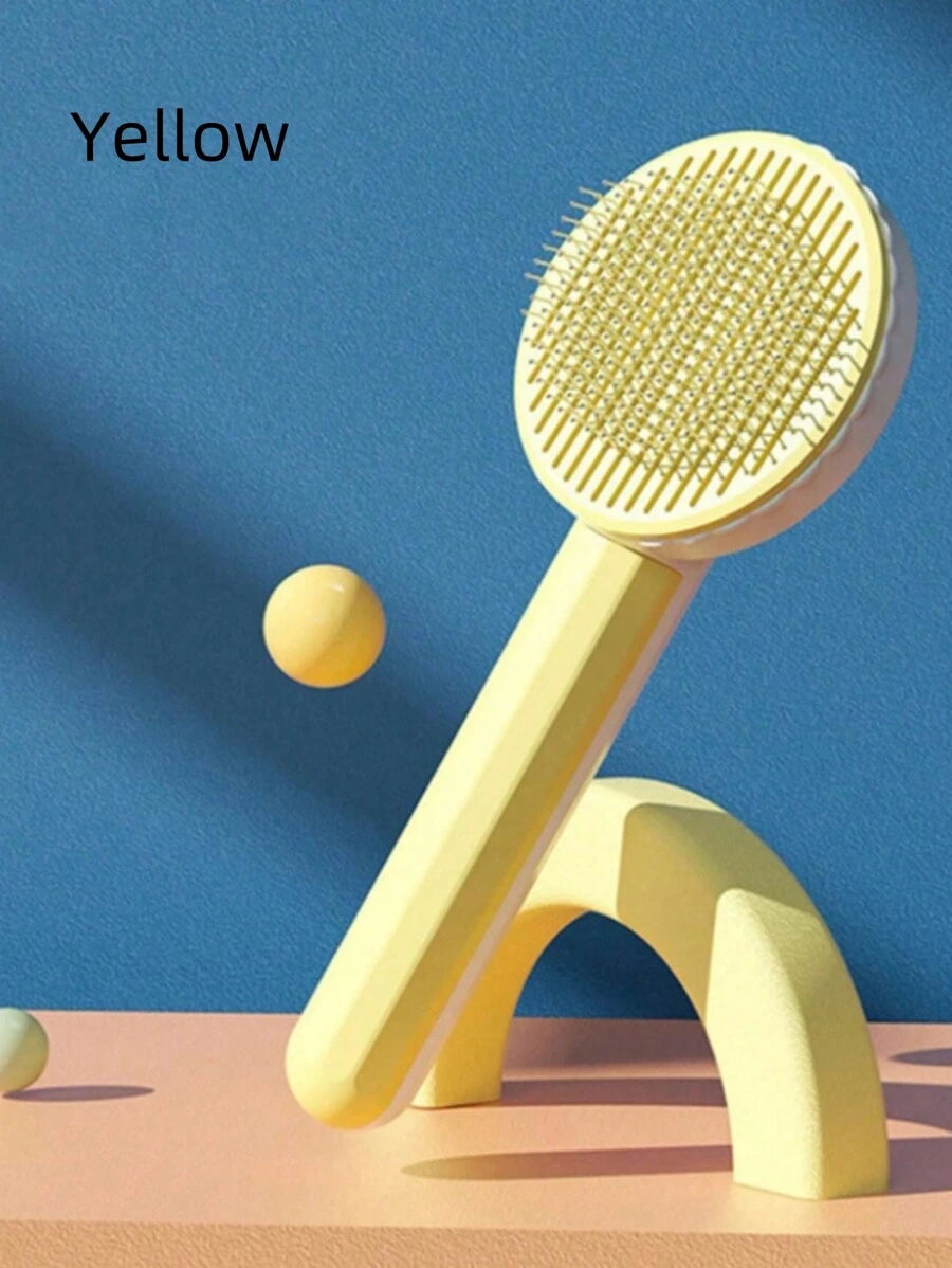 Puppy grooming brush gently detangling fur